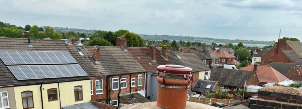 This is a photo taken from a roof which is being repaired by MCM Roofing Repairs Wimborne, it shows a street of houses, and their roofs